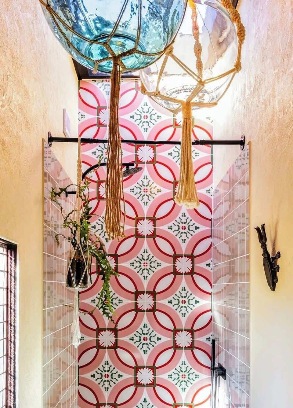 Rainforest shower up high plus a handy microphone style handpiece shower for washing your feet after the beach and shower solos into the full length wall mirror. 