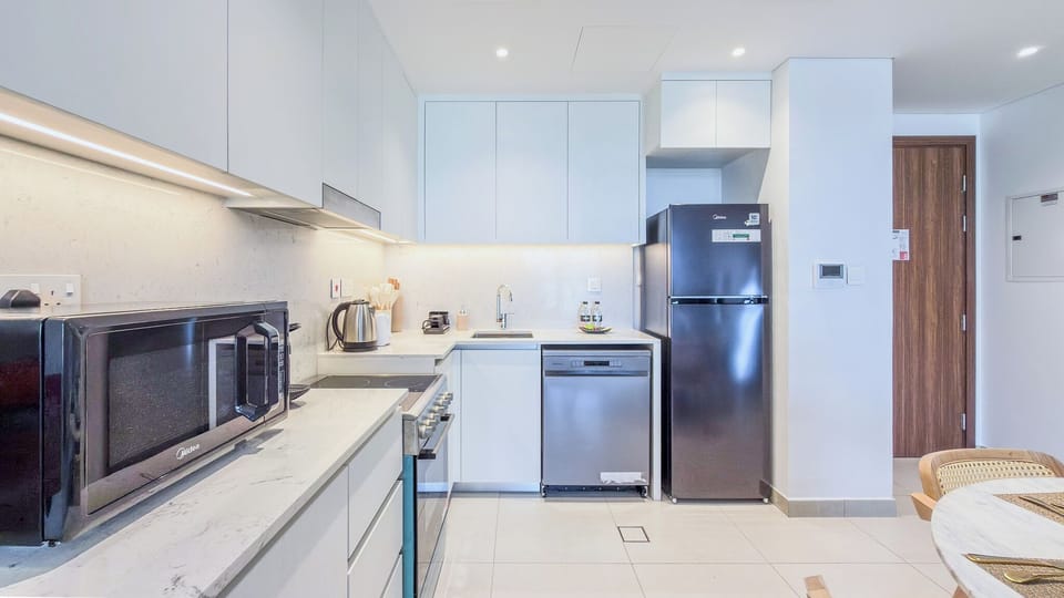 Apartment, Balcony, City View | Private kitchen | Espresso maker, coffee/tea maker