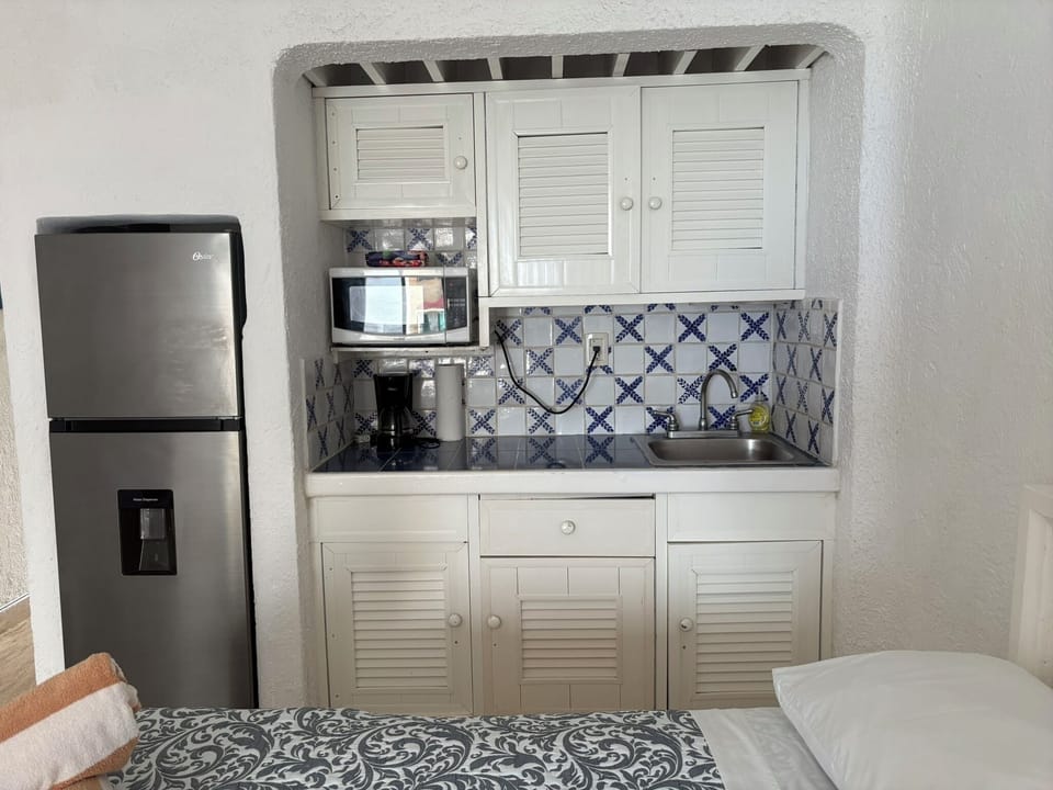 Comfort Studio, 2 Double Beds, Oceanfront | Private kitchen | Fridge, microwave, stovetop, toaster