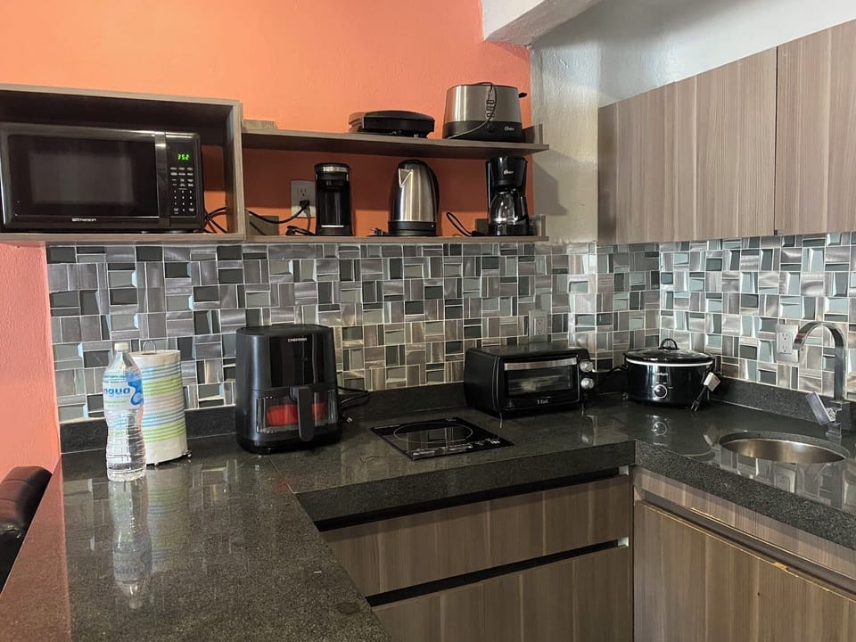 Premium Studio, Balcony, Beach View | Private kitchen | Fridge, microwave, stovetop, toaster