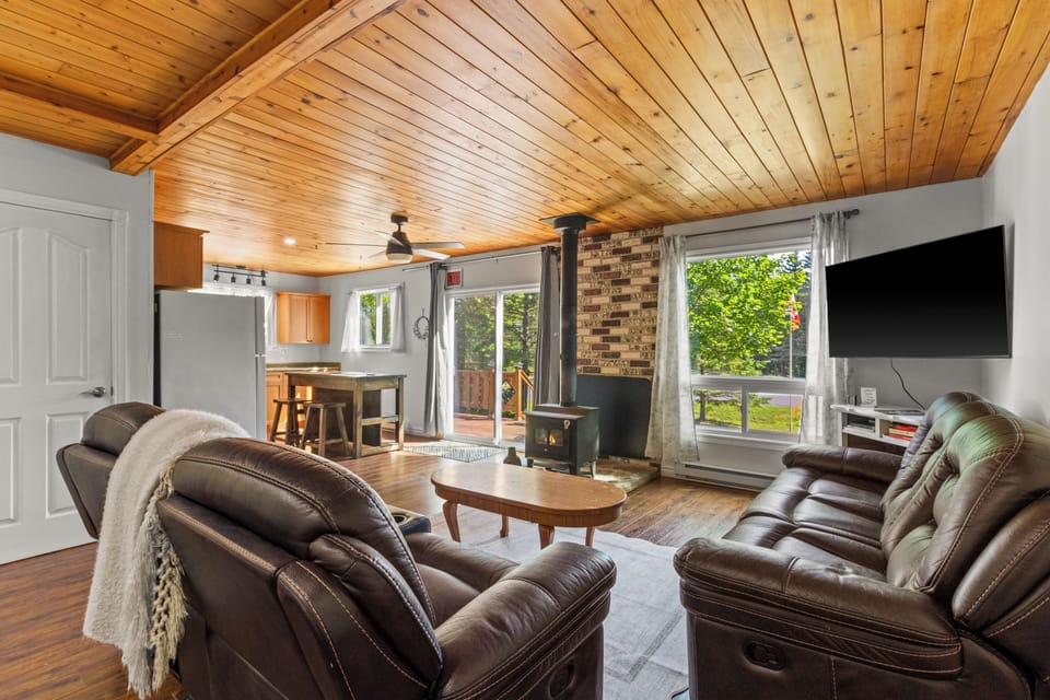Relax in the cozy open-concept living area after a day of exploring.