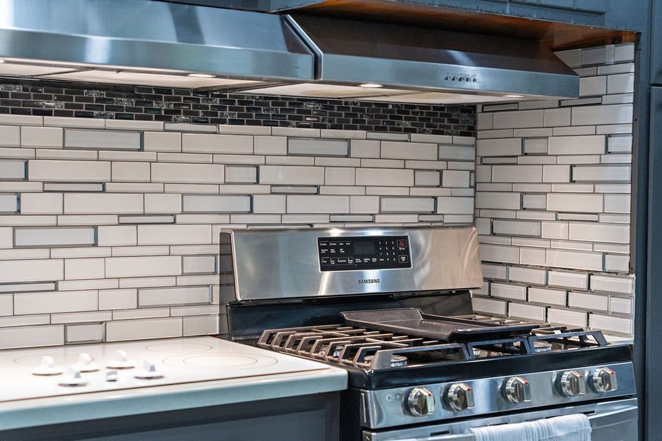 Featuring a gas range and plenty of prep space, the kitchen is ready for everything from morning coffee to holiday dinners