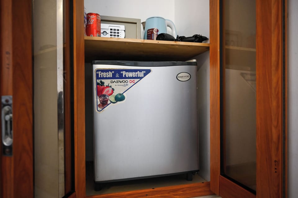 Executive Triple Room, Garden View | Minibar