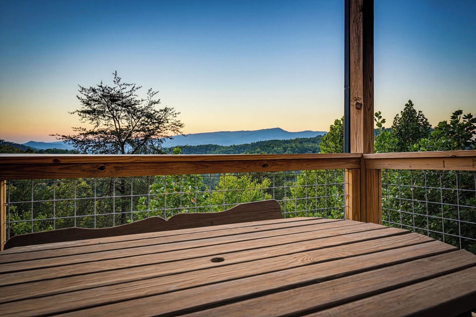 Enjoy meals outdoors at the deck table and chairs