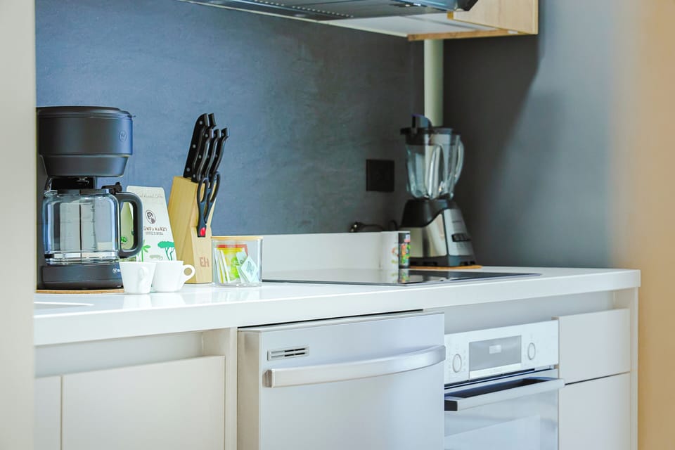 Your fully equipped kitchen makes meal prep effortless—complete with coffee maker, blender, oven, and all the essentials for enjoying home-cooked favorites during your stay.