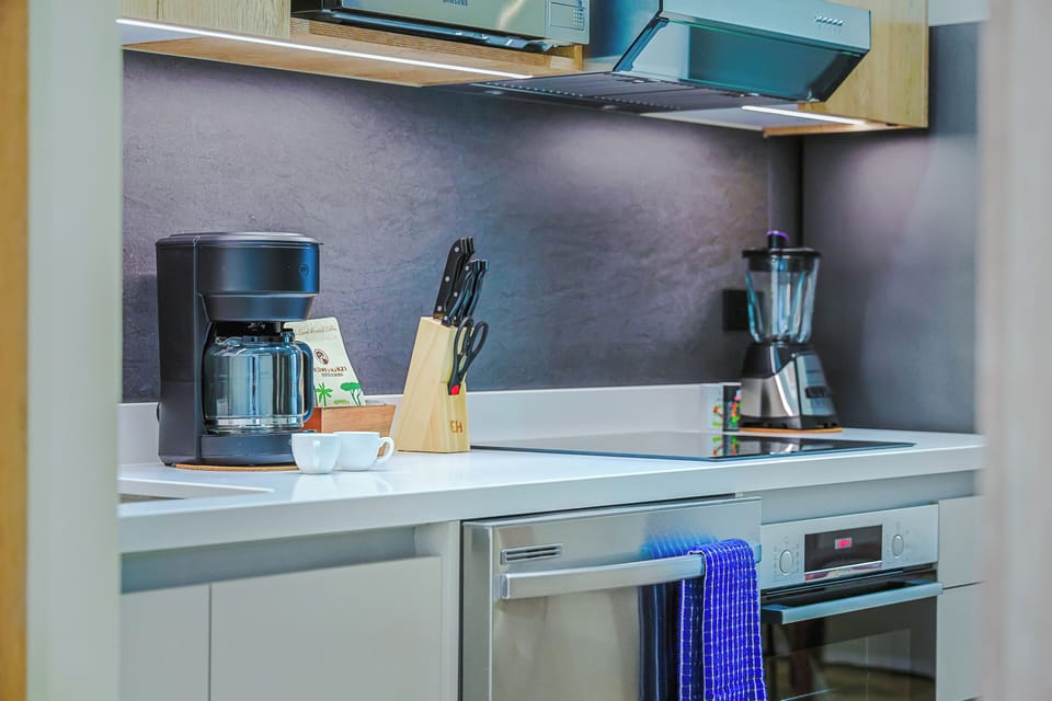 Your fully equipped kitchen makes it easy to prepare meals just the way you like them, with modern appliances and all the essentials at your fingertips.
