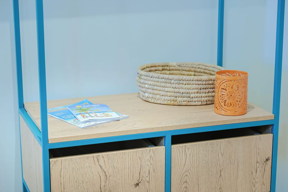 A thoughtful detail for your stay—find local guides, a decorative candle, and storage that keeps your space tidy and welcoming.