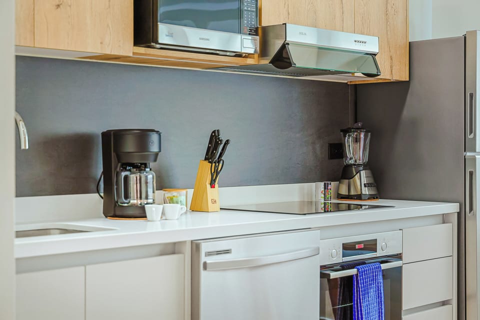 Your fully equipped kitchen makes it easy to prepare meals just the way you like them, with modern appliances and all the essentials at your fingertips.