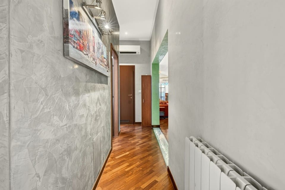 Interior corridor with parquet, stylish finishes and atmospheric lighting