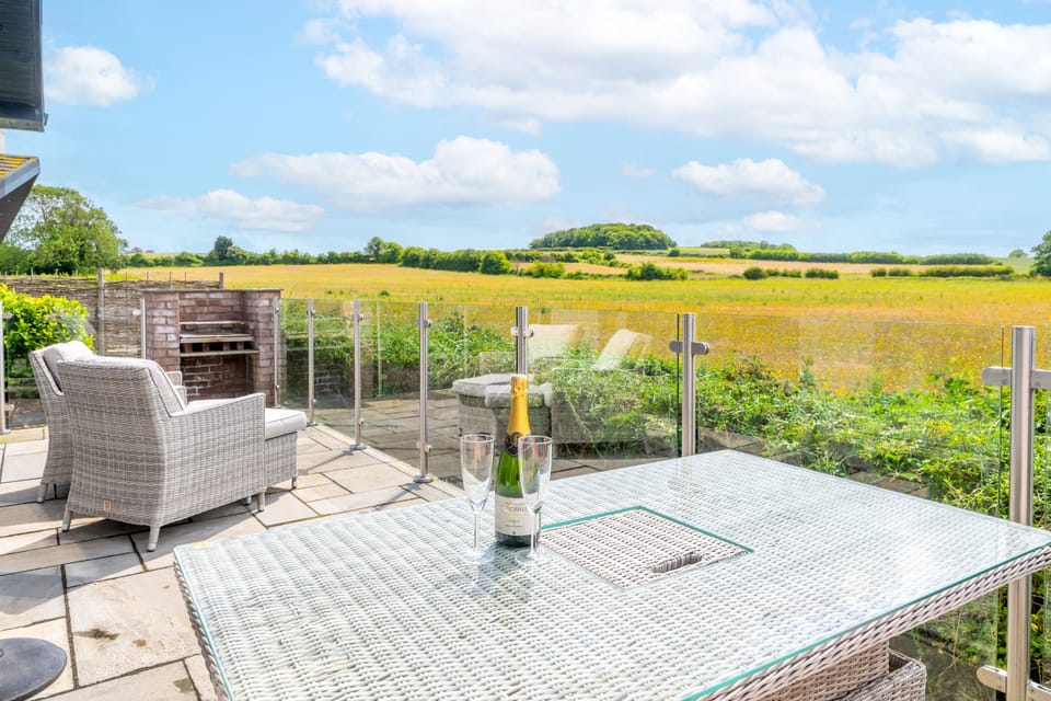 Enjoy comfortable seating on the patio and enjoy the open view