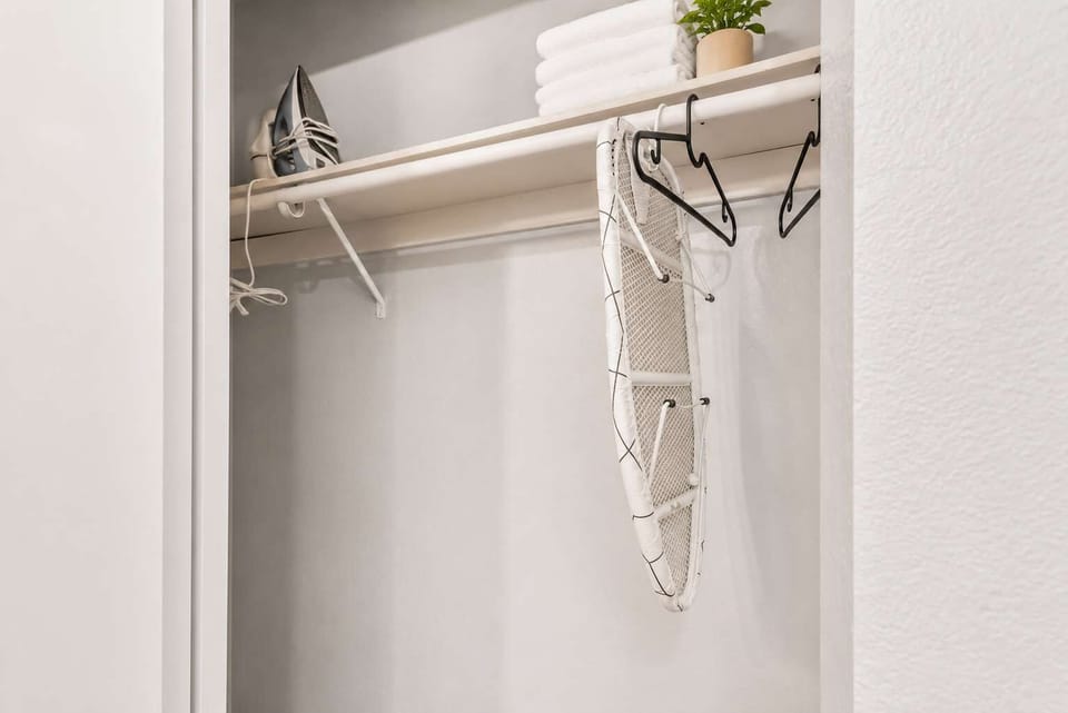 Well-organized closet designed for convenience and ease.