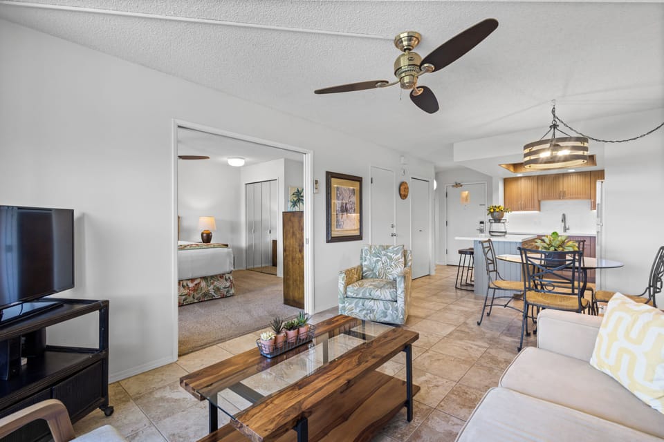 Relax in your bright, open living space where ceiling fans keep you comfortable and a welcoming layout connects you to the kitchen and bedroom. Settle in and feel right at home.