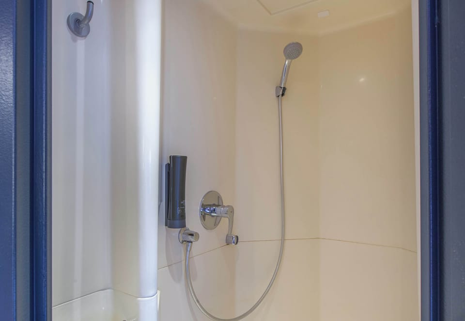 Shower, free toiletries, hair dryer, towels