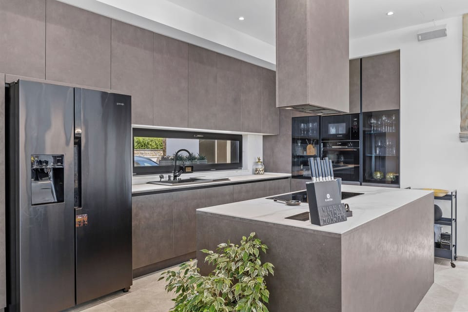 Villa | Private kitchen | Espresso maker, coffee/tea maker, fridge, microwave