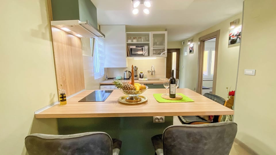 Apartment (A1) | Private kitchen | Espresso maker, fridge, microwave, stovetop