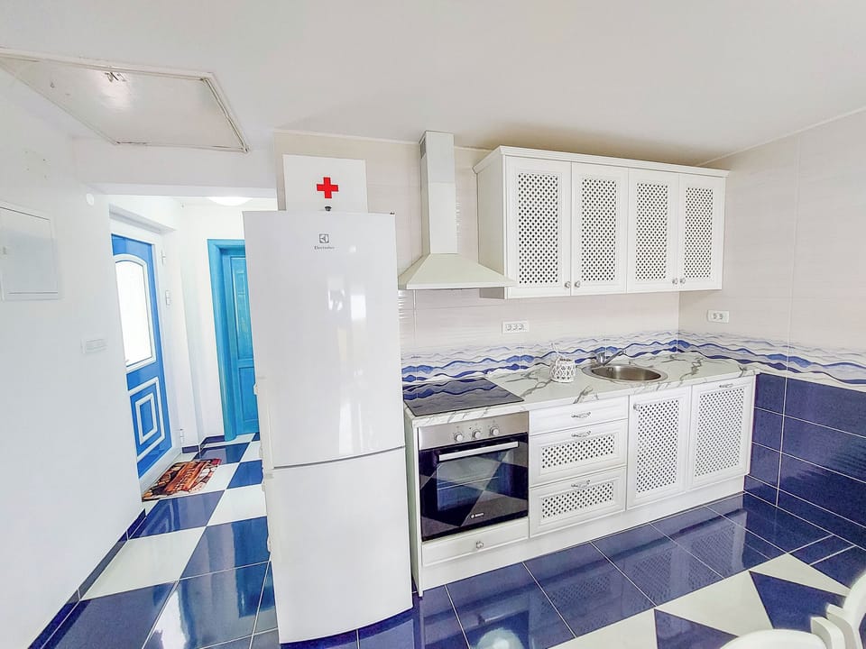 Apartment (A1) | Private kitchen | Espresso maker, fridge, microwave, oven