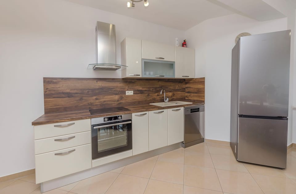 Apartment (A1) | Private kitchen | Espresso maker, fridge, microwave, oven