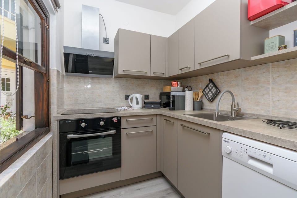 Apartment (A1) | Private kitchen | Espresso maker, fridge, microwave, oven