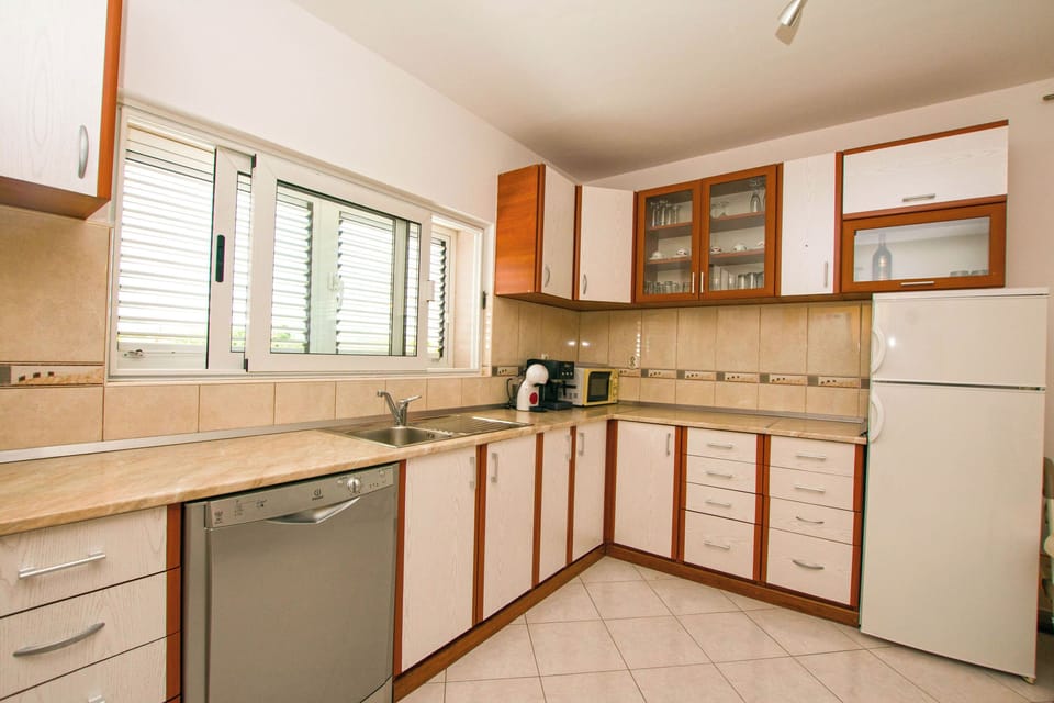Apartment (A1) | Private kitchen | Espresso maker, fridge, microwave, oven