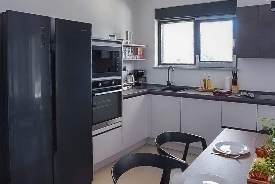 Villa | Private kitchen | Espresso maker, fridge, microwave, oven