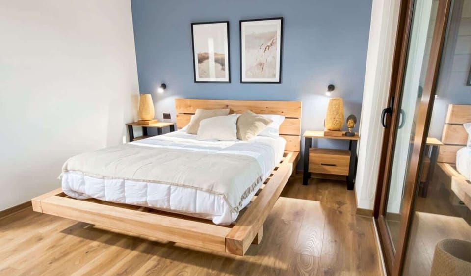 Bedroom with blue accent wall