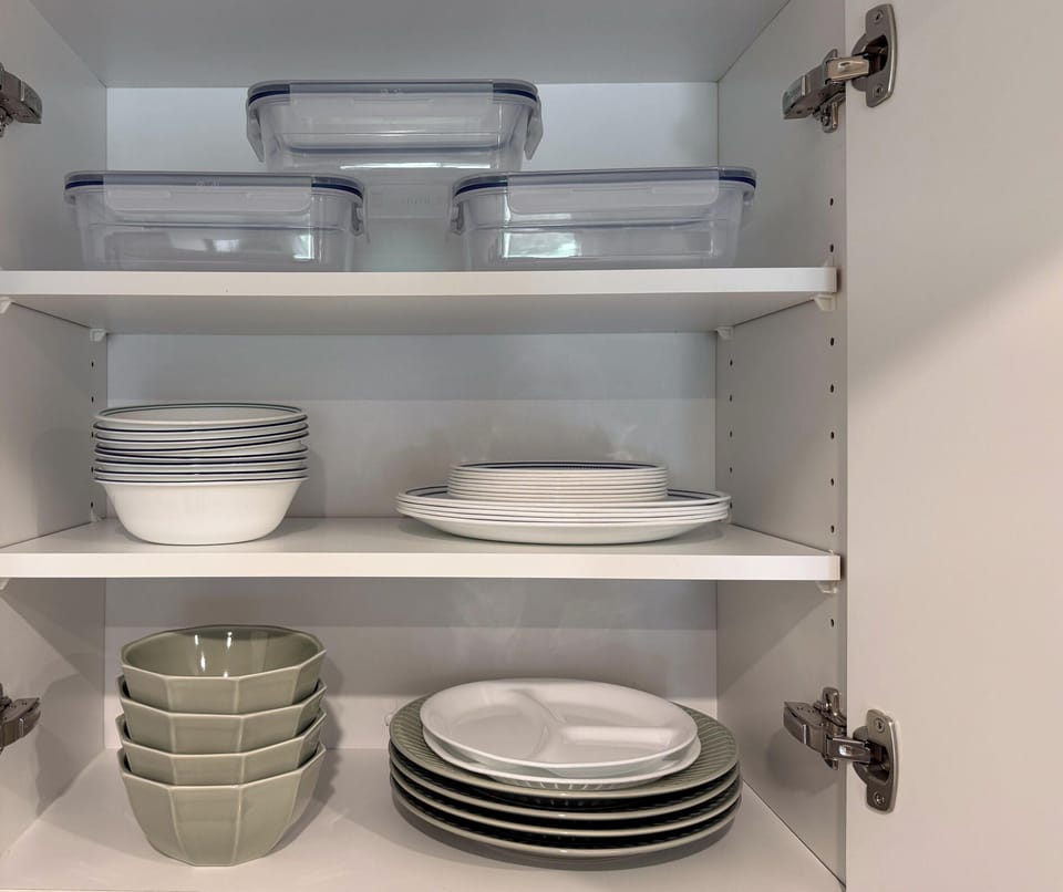 Dishes and cookware set for a full group meal