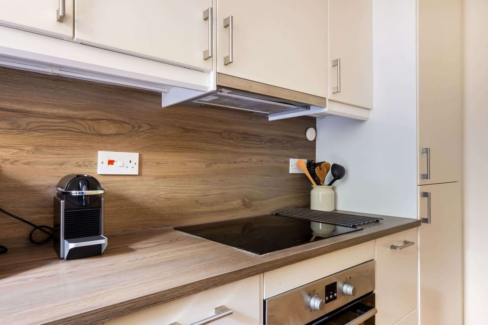 The kitchen is fully equipped to prepare a simple meal 