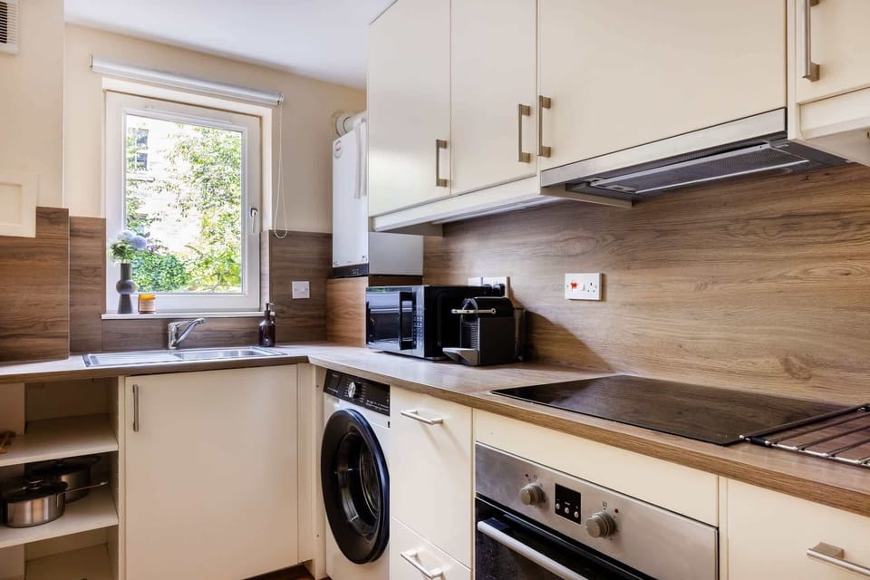 The kitchen is fully equipped to prepare a simple meal 