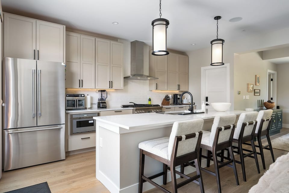 Enjoy family breakfasts or evening cocktails—a bright, welcoming heart for your stay.