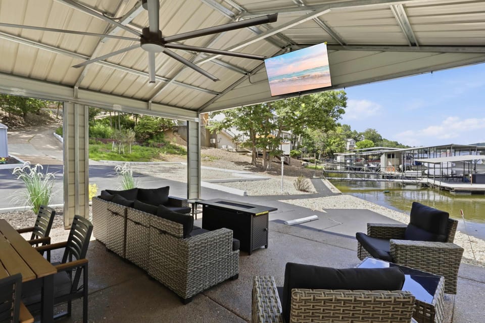 Take a break from sightseeing with a classic game and entertainment area.	Vacation rental game room featuring a dartboard, TV, and entertainment space for guests.