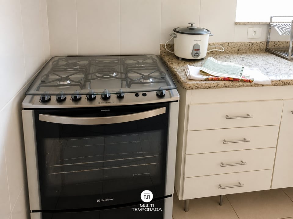 Family House | Private kitchen | Cookware/dishes/utensils, freezer, dining table, kitchen island