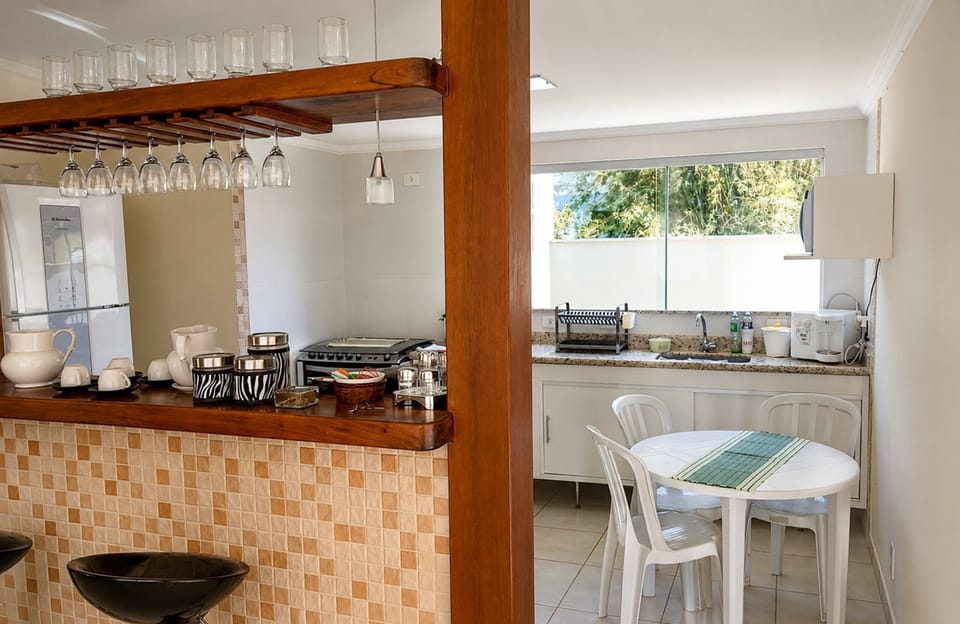 Family House | Private kitchen | Cookware/dishes/utensils, freezer, dining table, kitchen island