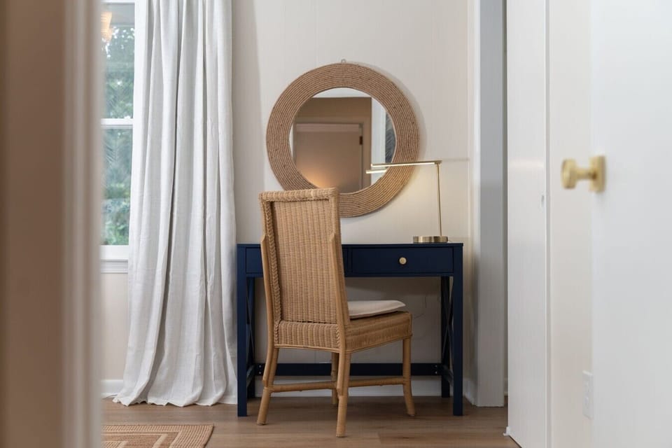 Bedroom 2’s dedicated work desk — for the one who `just has one call.`