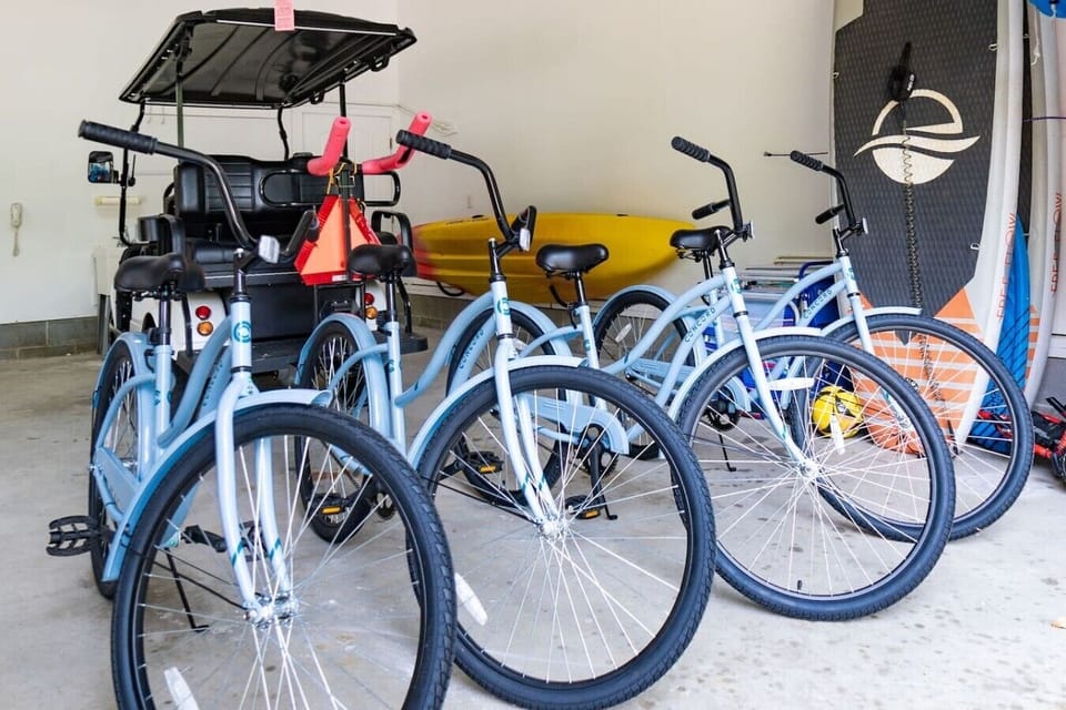 Never run out of fun with our supply of Bikes, Golf Cart, Paddle Board 2 person kayak, life jackets, all included!