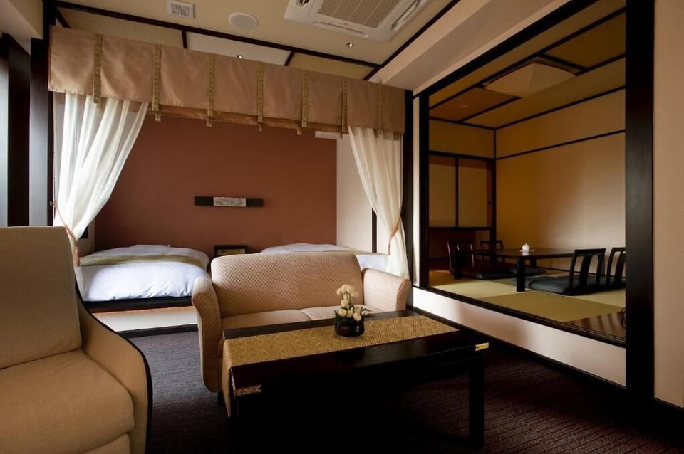 Japanese Western Style Twin Room with Japanese Futon and Private Open-air Bath, Non-Smoking | Down comforters, in-room safe, individually decorated