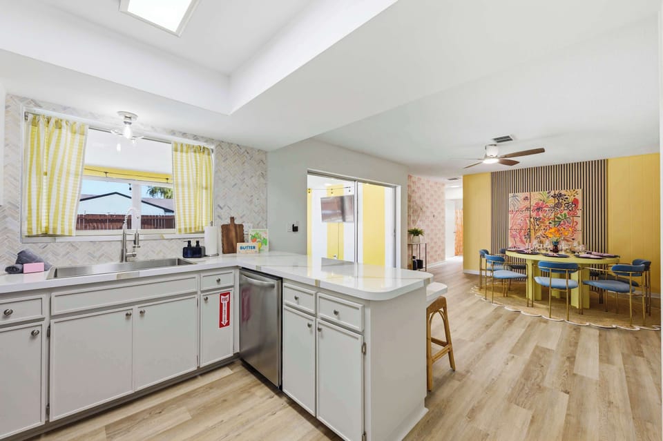 Whip up a feast in a kitchen with everything you need, then gather at the table just steps away.