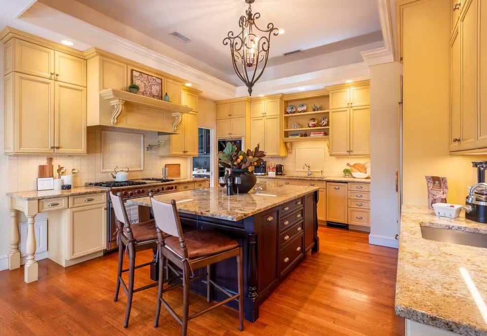 Pull up a stool at the granite island to enjoy a fresh brew, surrounded by warm 