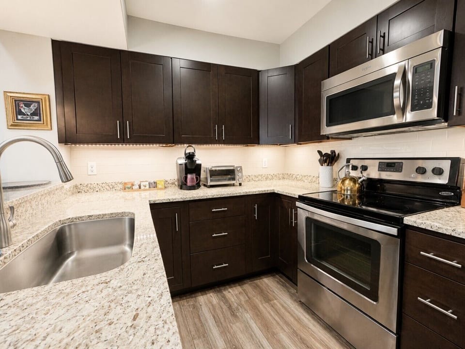 Fully equipped kitchen, marble counter tops