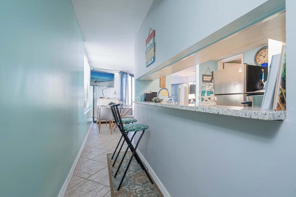 Additional counter seating at the full kitchen