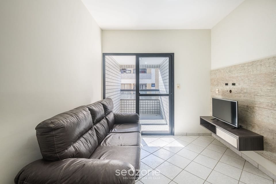 Basic Apartment | Living area | 40-inch TV with digital channels