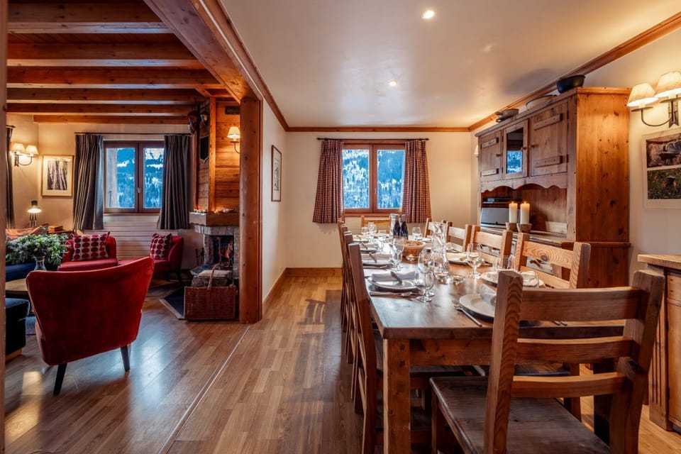 Savor delicious meals in the light-filled dining area, set for a memorable gathering.