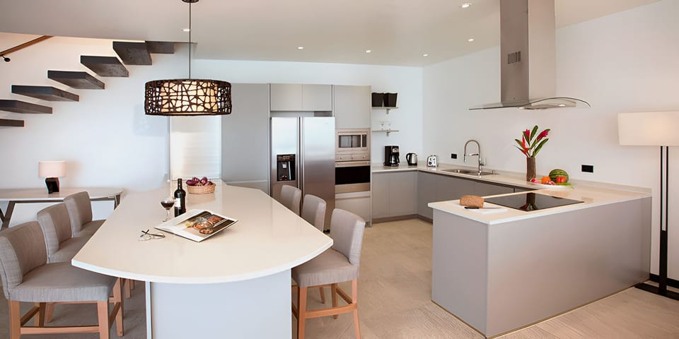 Gather for long, leisurely meals in a sleek chef’s kitchen.