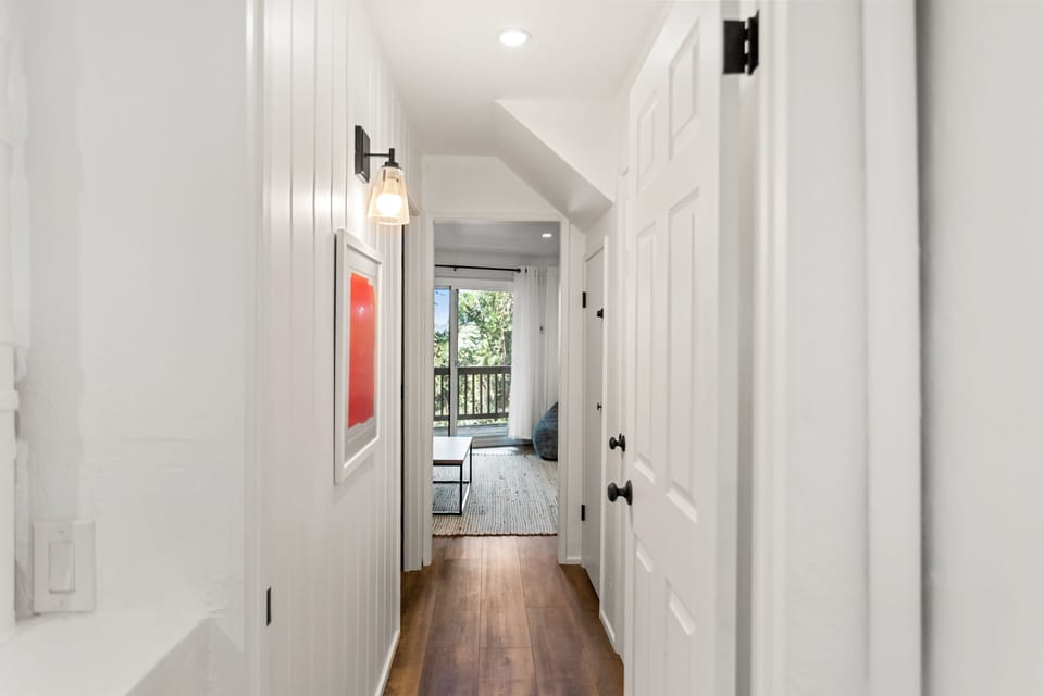Hallway leading to one of the top floor bedrooms.