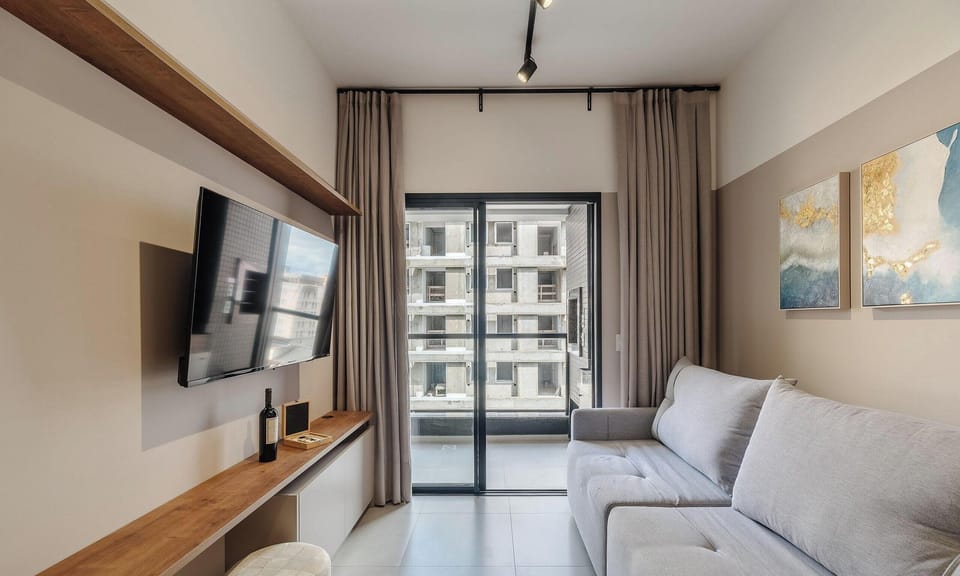 Basic Apartment | Living area | 40-inch TV with digital channels