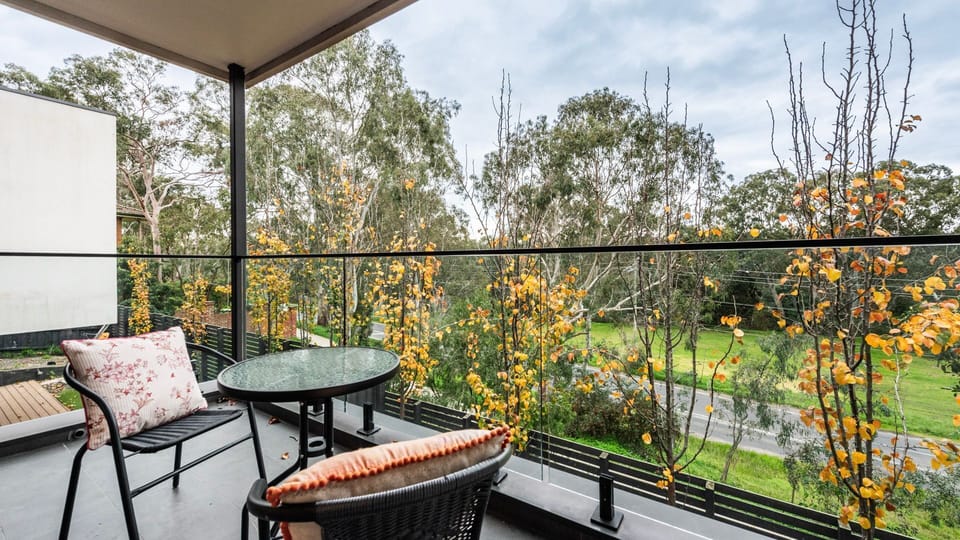 Enjoy your morning coffee surrounded by peaceful leafy views.