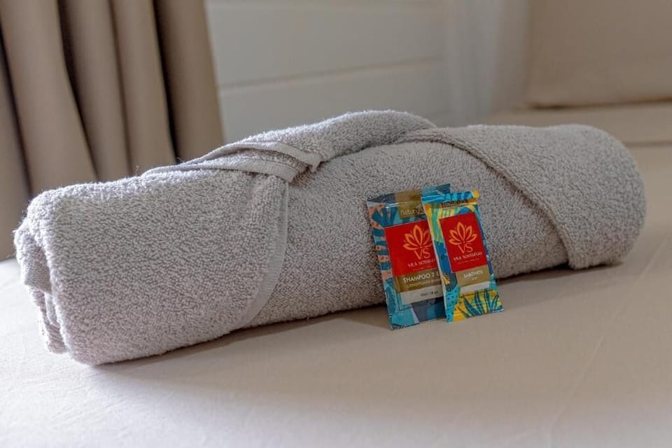 Comfort Quadruple Room, Lanai, Garden View | Bathroom amenities