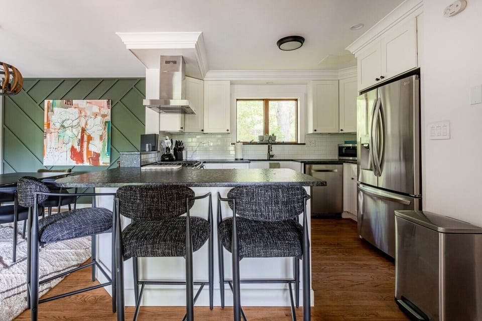 Gather around the island for morning coffee, family meals, or cocktails