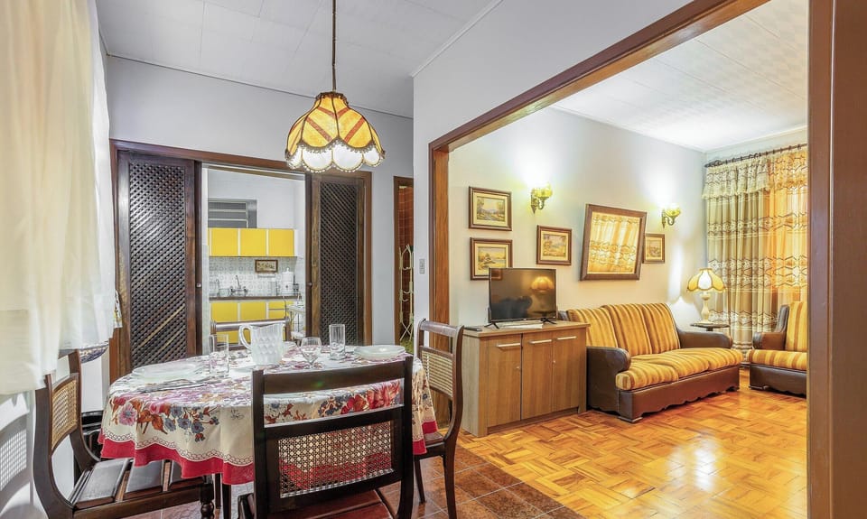 Basic Apartment | Living area | 40-inch TV with digital channels