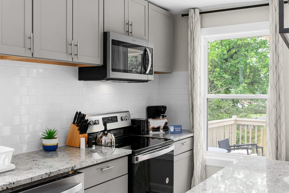 Enjoy the open layout with a central island, ample counter space, and all the essentials ready—designed to keep cooking simple and stress-free.