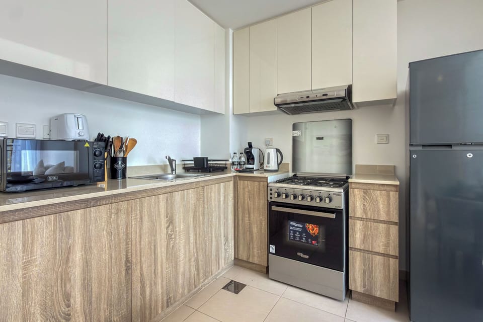 Deluxe Apartment, Balcony, Pool View | Private kitchen | Espresso maker, coffee/tea maker